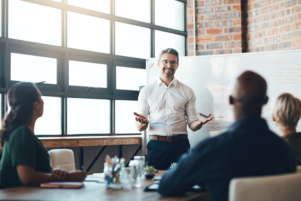 marketing-whiteboard-presentation-meeting-group-business-huskimarketing.com