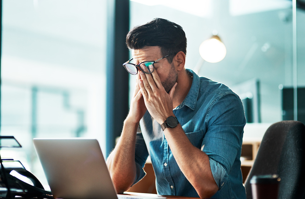 stressed-overwhelmed-entrepreneur-business-huskimarketing.com